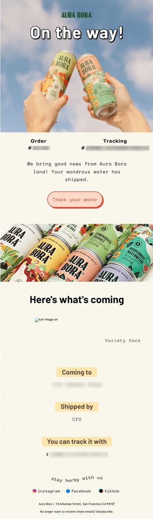 Aura Bora shipping confirmation email announcing that the order is on the way, with colorful branded product imagery, order and tracking numbers, a Track Your Water button, shipped product details, delivery destination, UPS carrier information, and shipment tracking.